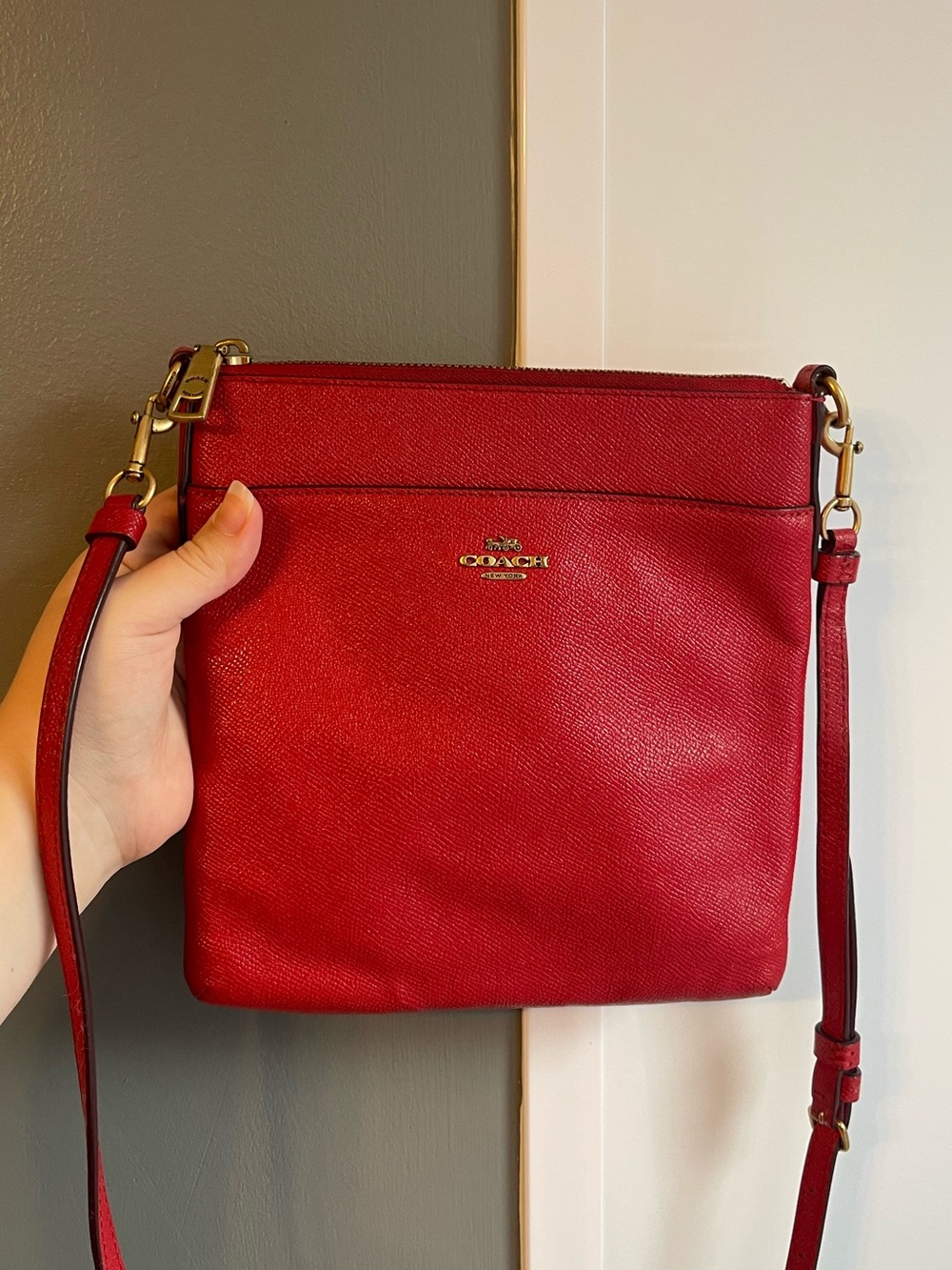 31. Coach red crossbody